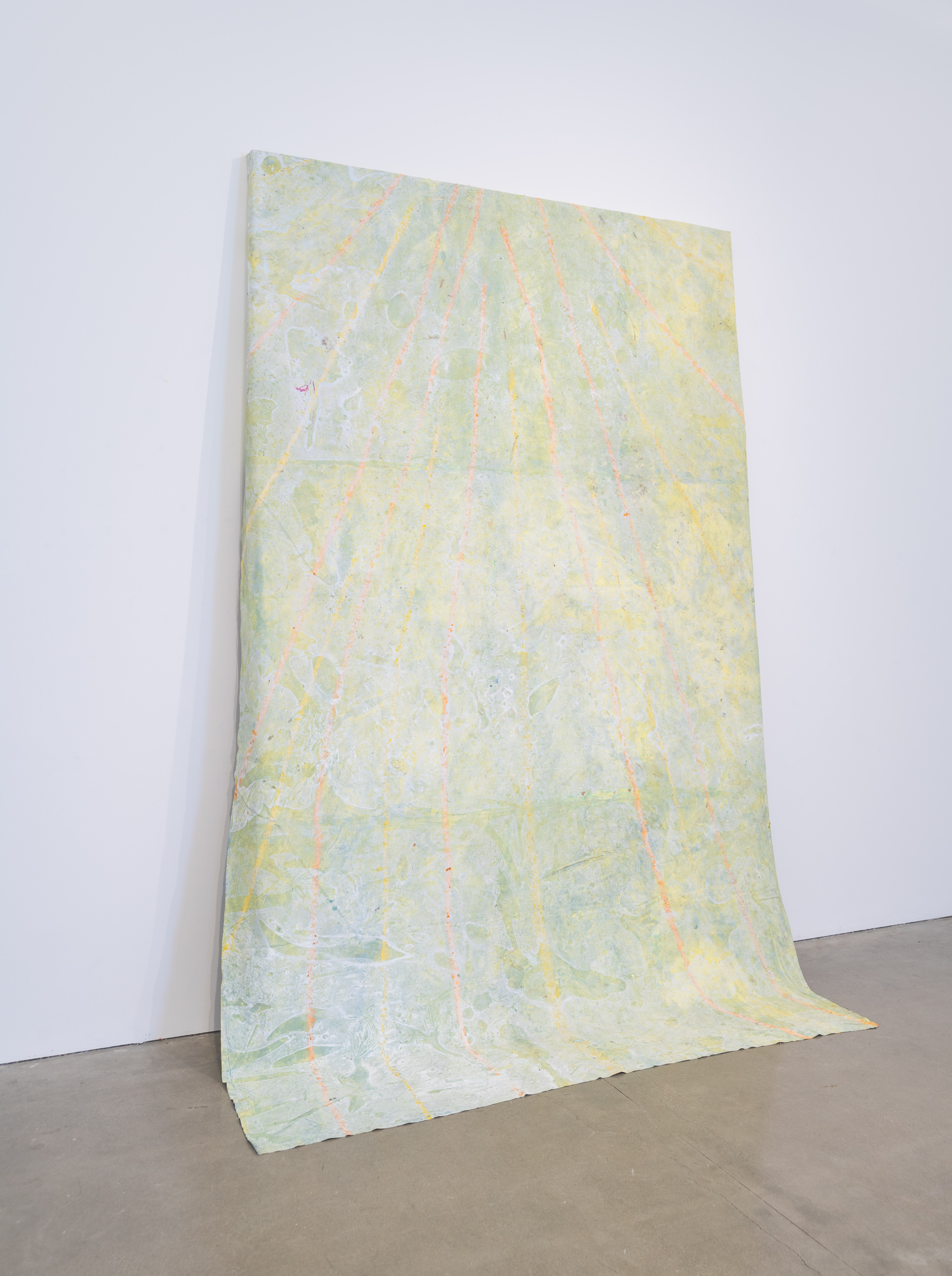 Yellow painting 10 feet by 6.5 feet leaning on the ground 
