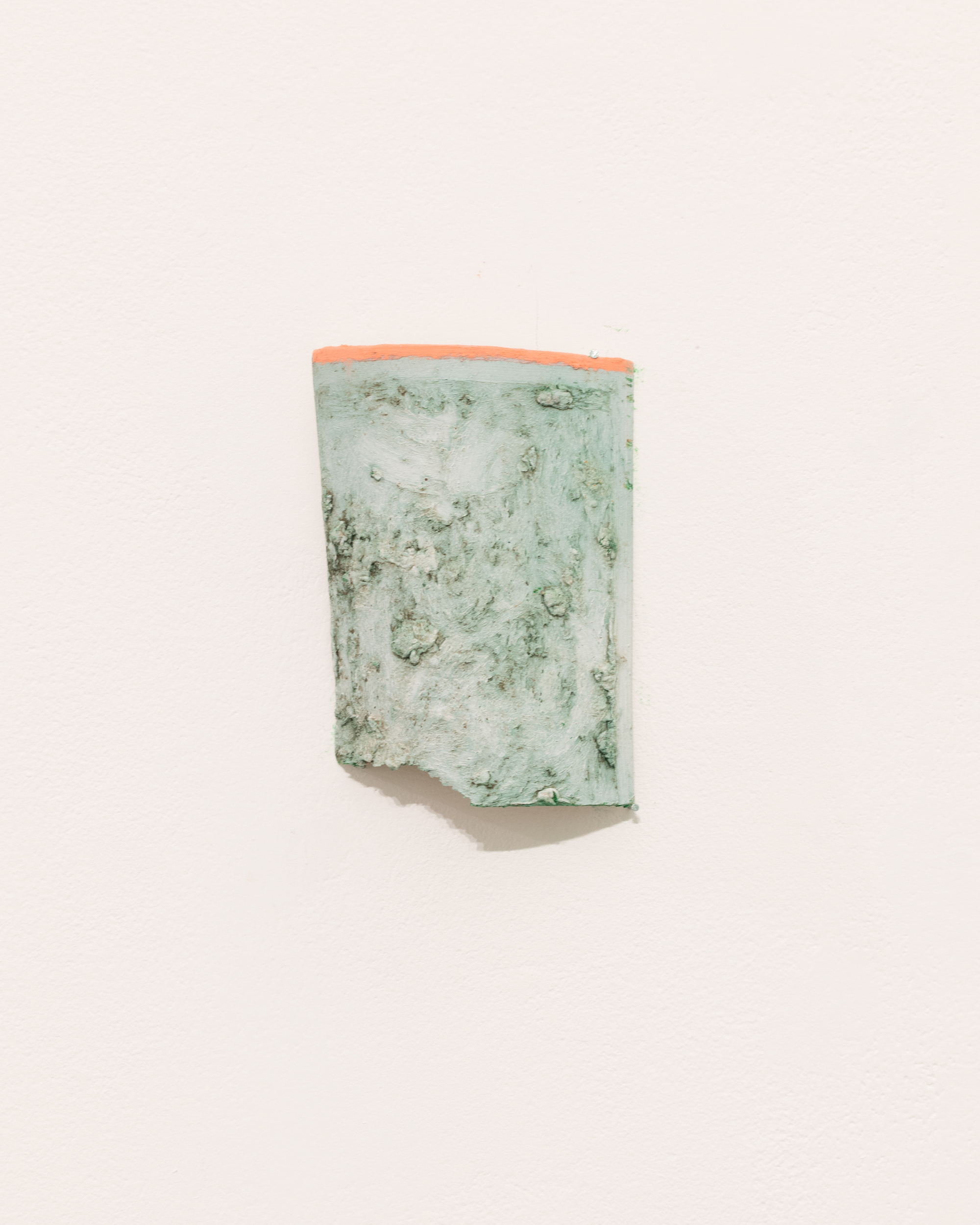 Installation views thesis exhibition containing colorful paintings stretched and unstretched, hanging in space and attached to the wall
