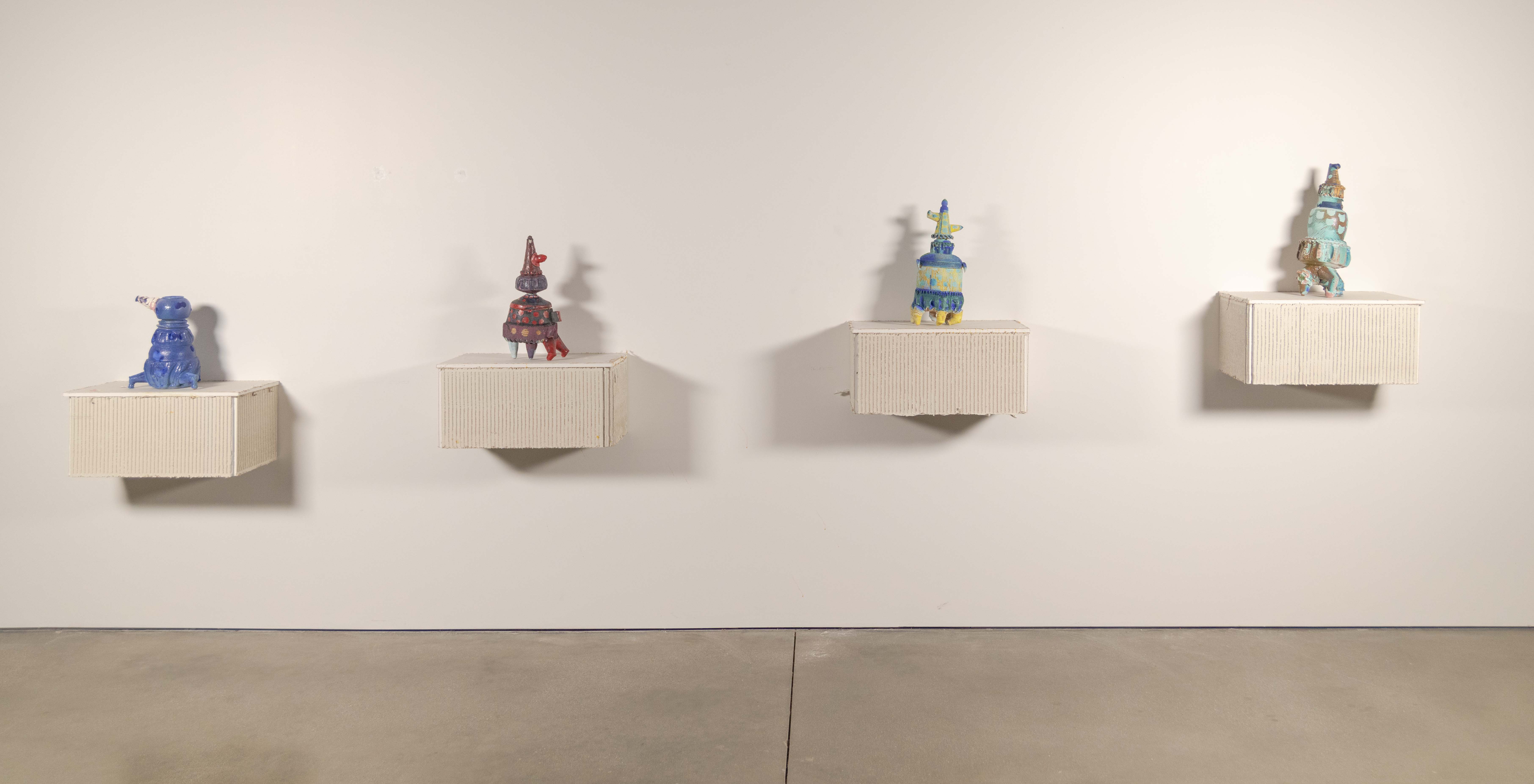 Drywall cut in the shape of the silhouette of a trojan Horse. The head, piece of the
tail, and legs have been removed, A brick pattern is cut into the interior of the horse. You can
look at the stratification that builds the form. From the paper on the outside of the drywall, to
the interior gypsum and brown paper oN the back of the substrate.