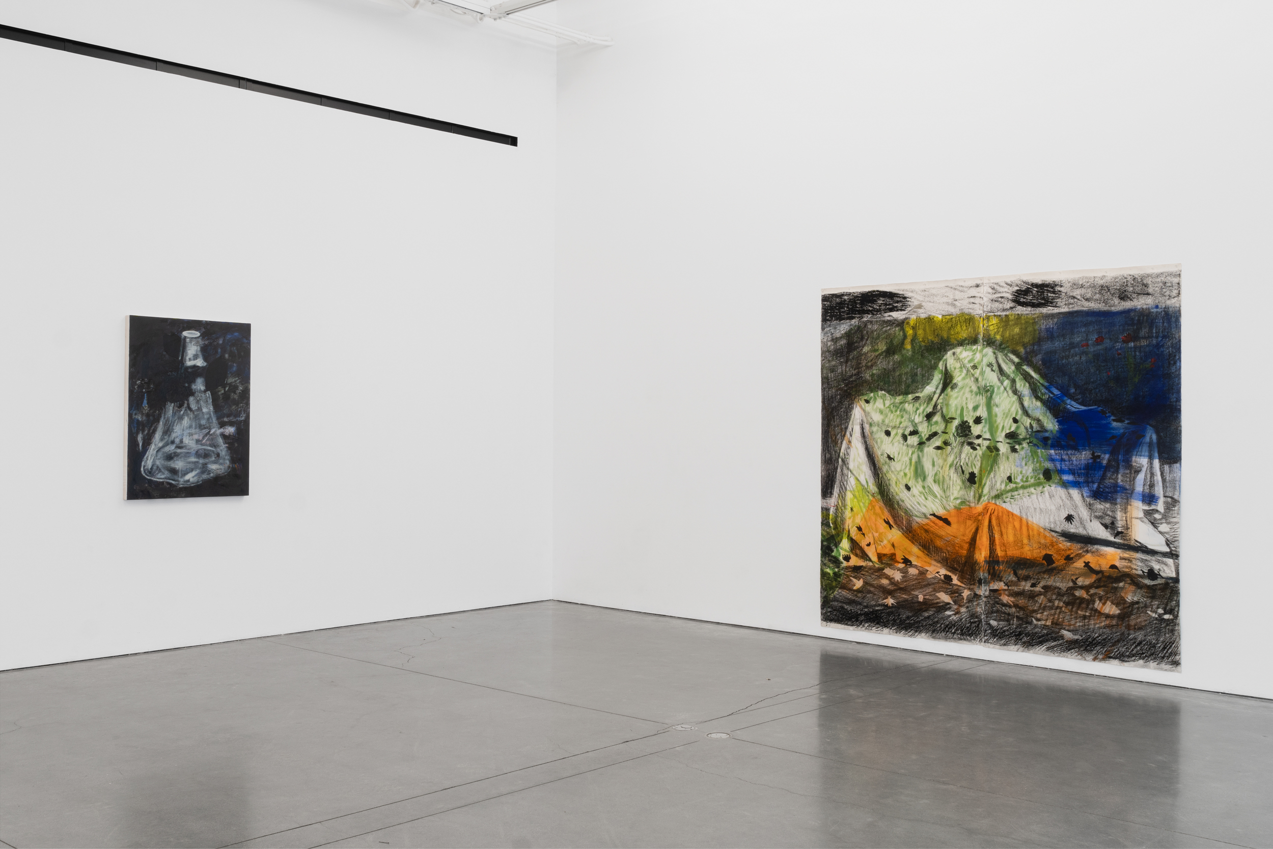 gallery view with votive painting and flask